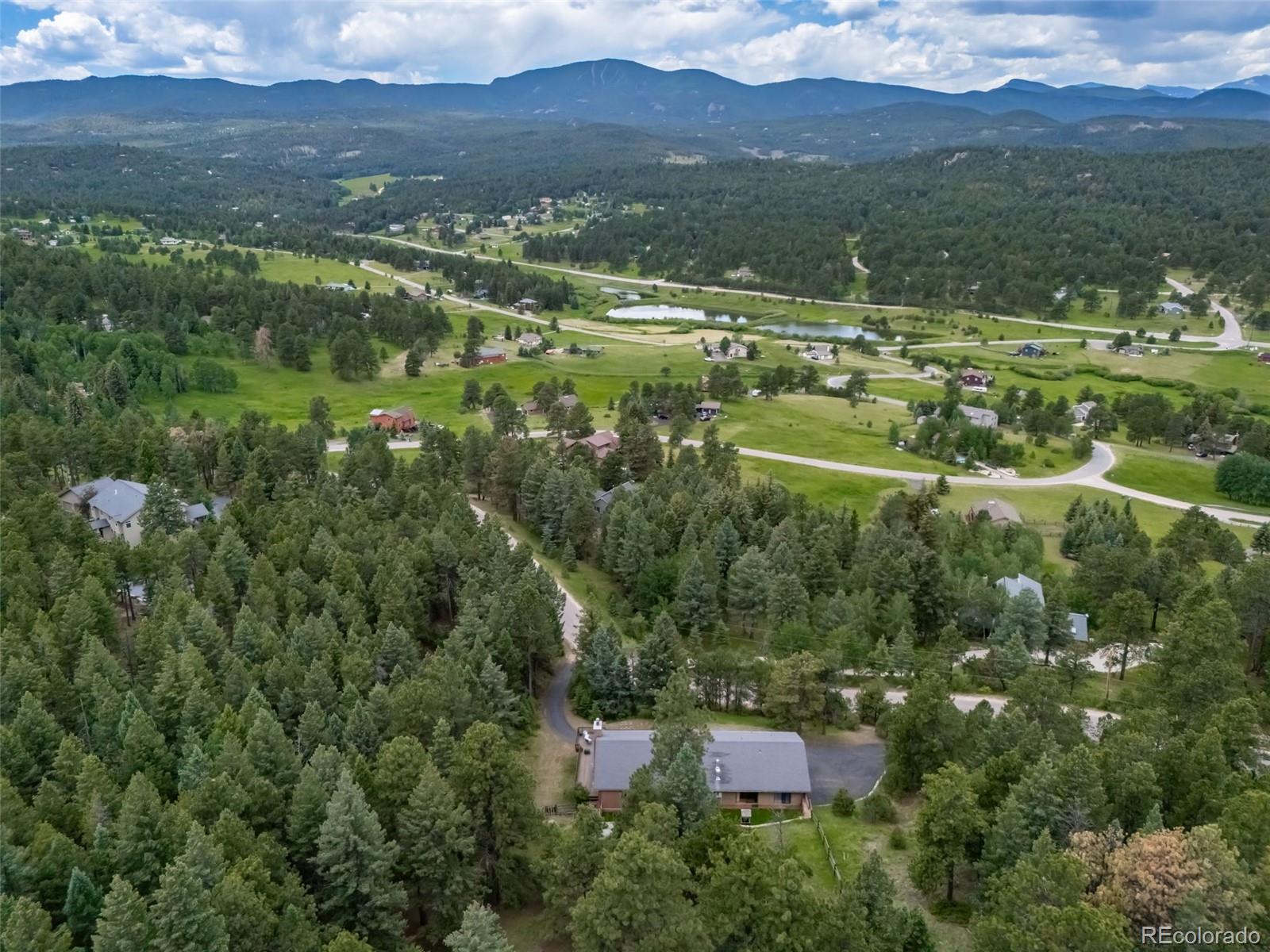 Evergreen Meadows Evergreen Home | MLS #: 82936817815  Armadillo Trail, Evergreen Beds: 5 Baths: 3 Price: $975,000