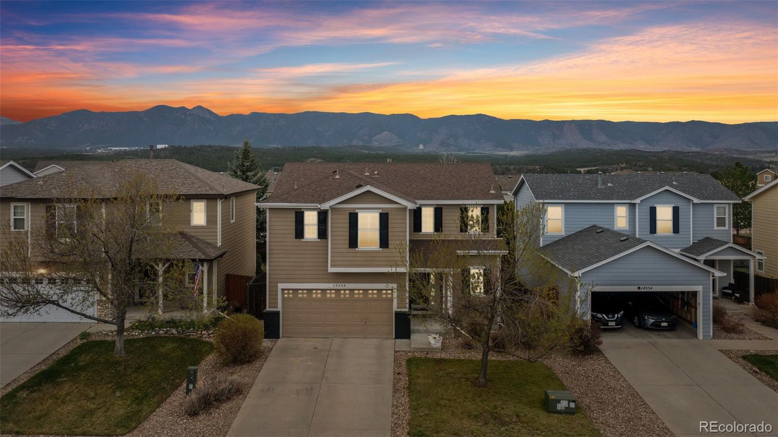 Falcon Colorado Springs Home | MLS #: 208218814248  Woodrock Path, Colorado Springs Beds: 4 Baths: 3 Price: $460,000
