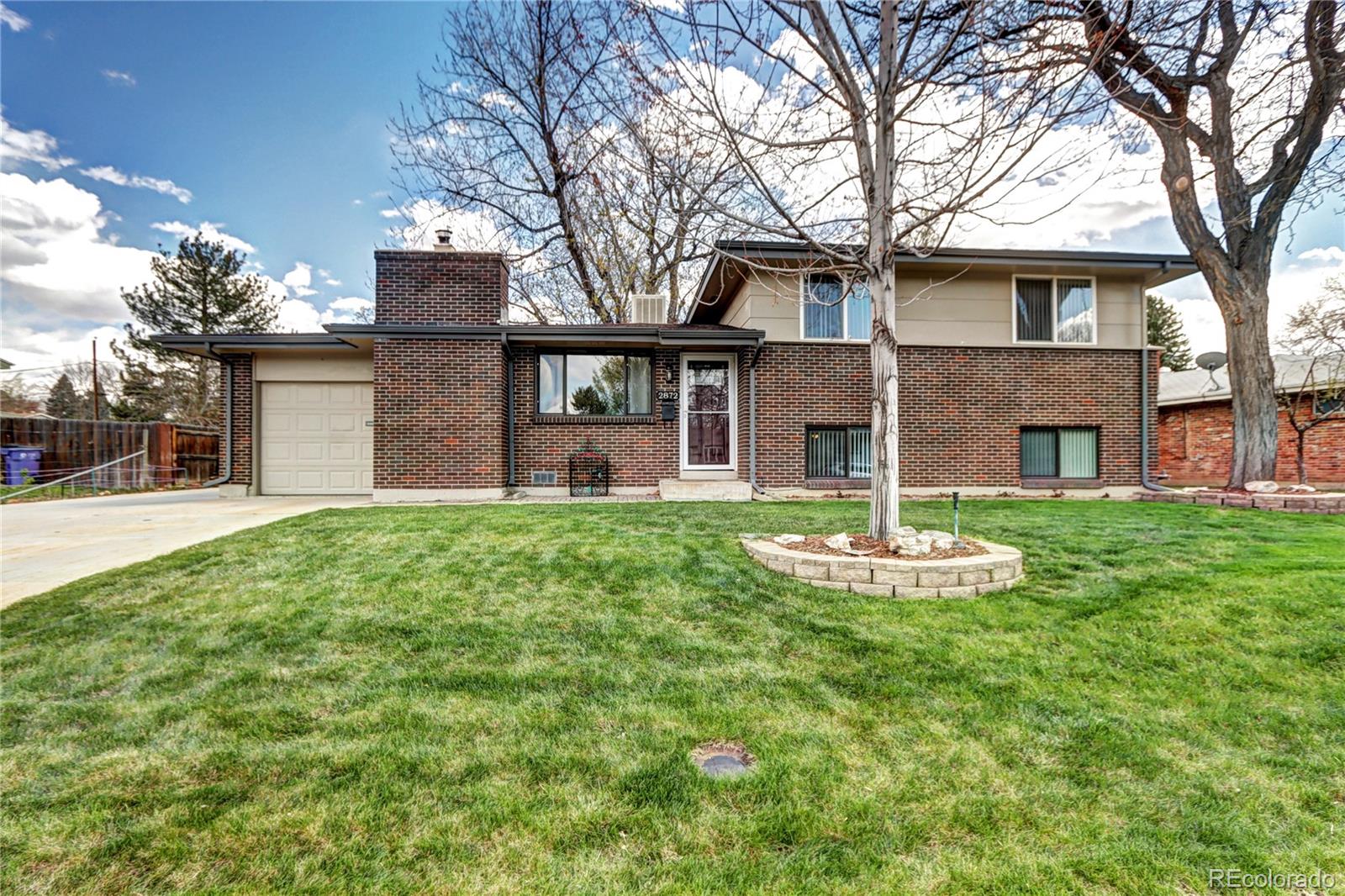 2872 S Ivan Way, denver MLS: 4289614 Beds: 4 Baths: 3 Price: $639,900