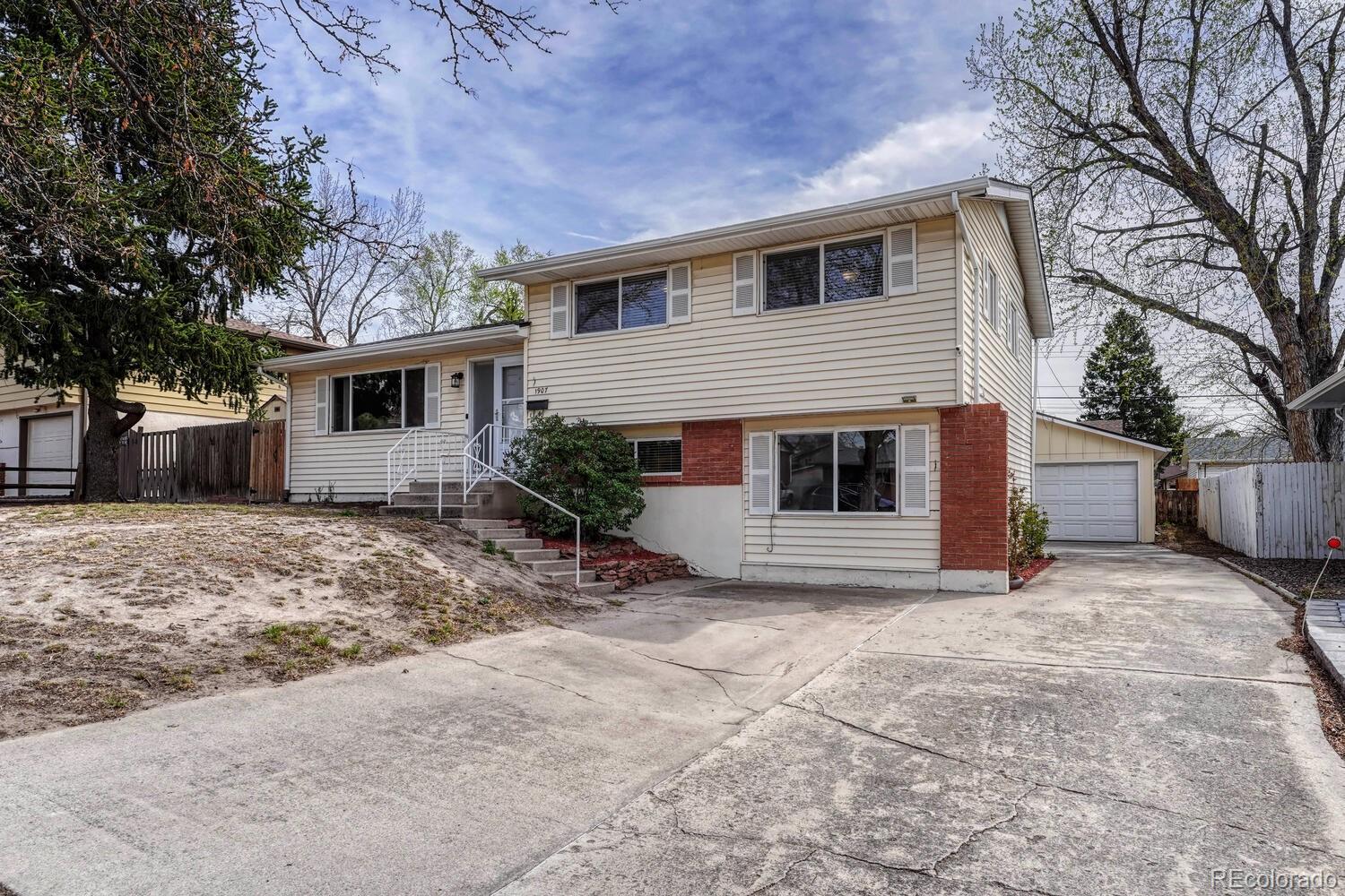 Alpine Acres Colorado Springs Home | MLS #: 90361301907  Snyder Avenue, Colorado Springs Beds: 4 Baths: 3 Price: $399,000