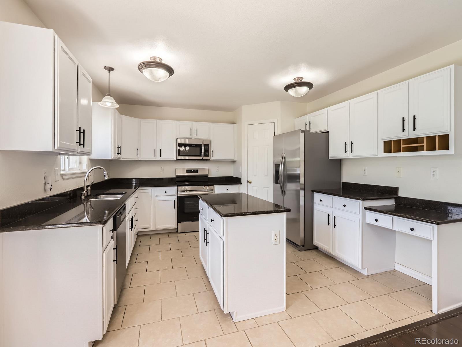 Mountain Shadows Greeley Home | MLS #: 94942808614  19th Street, Greeley Beds: 4 Baths: 4 Price: $460,000