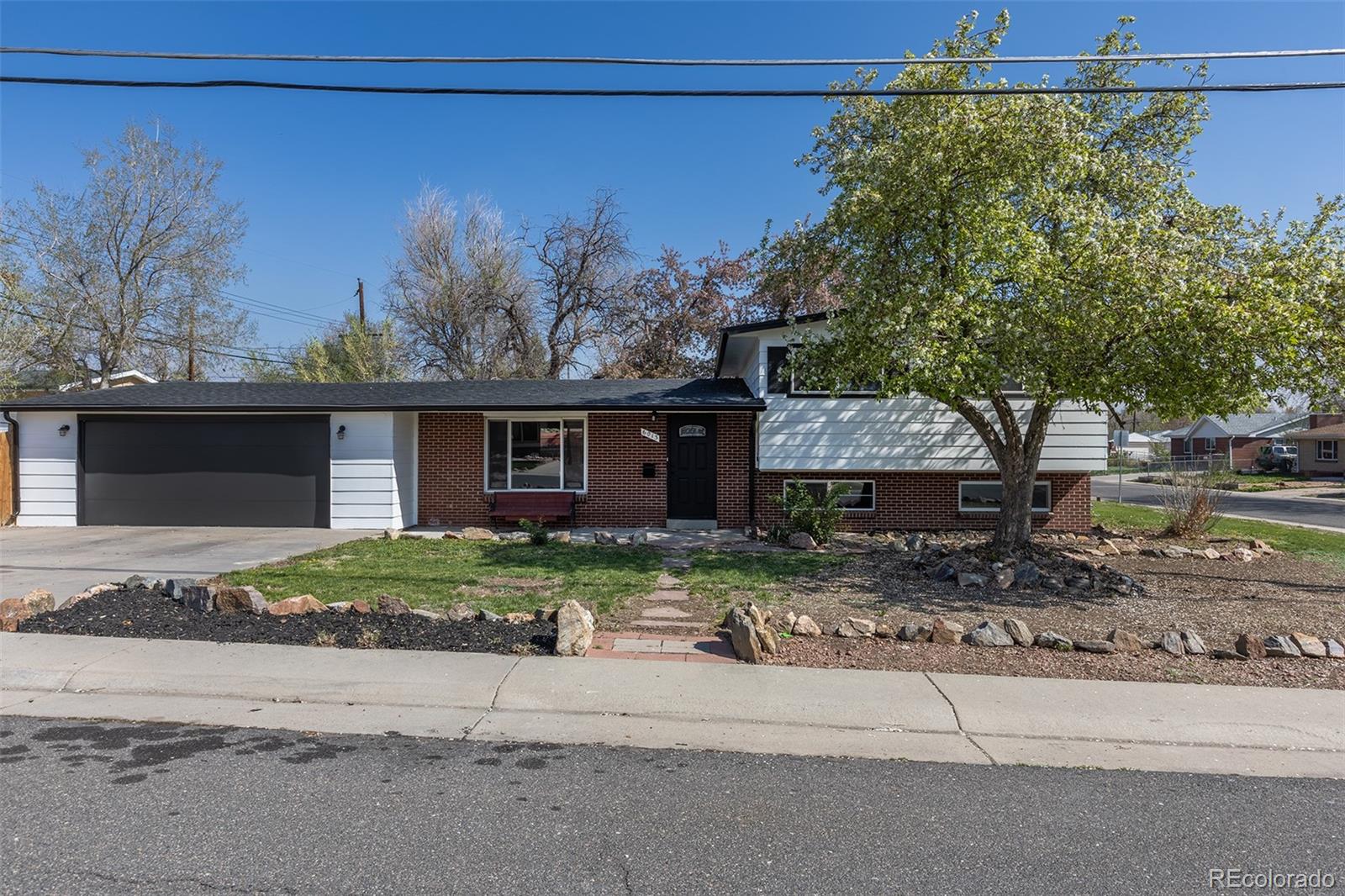 Lamar Heights Arvada Home | MLS #: 62465566013 W 62nd Avenue, Arvada Beds: 4 Baths: 3 Price: $559,999