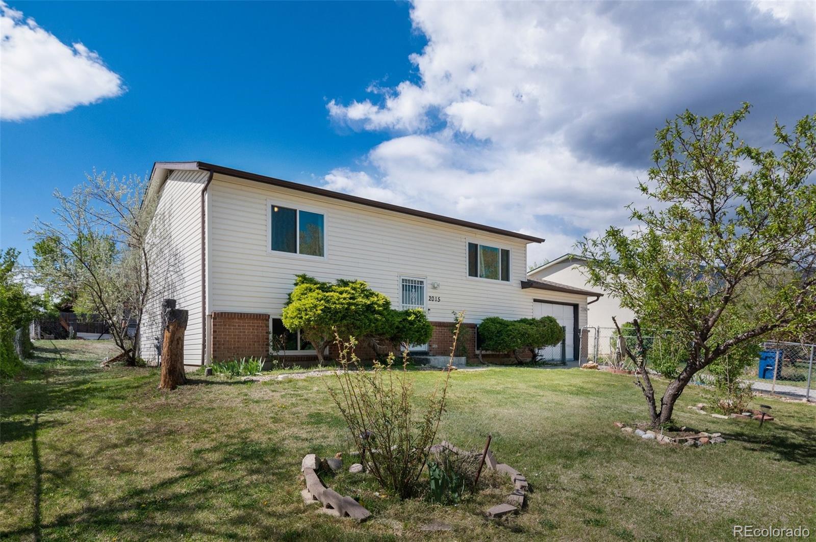 Stratmoor South Colorado Springs Home | MLS #: 39764592015  Hampton , Colorado Springs Beds: 4 Baths: 2 Price: $340,000