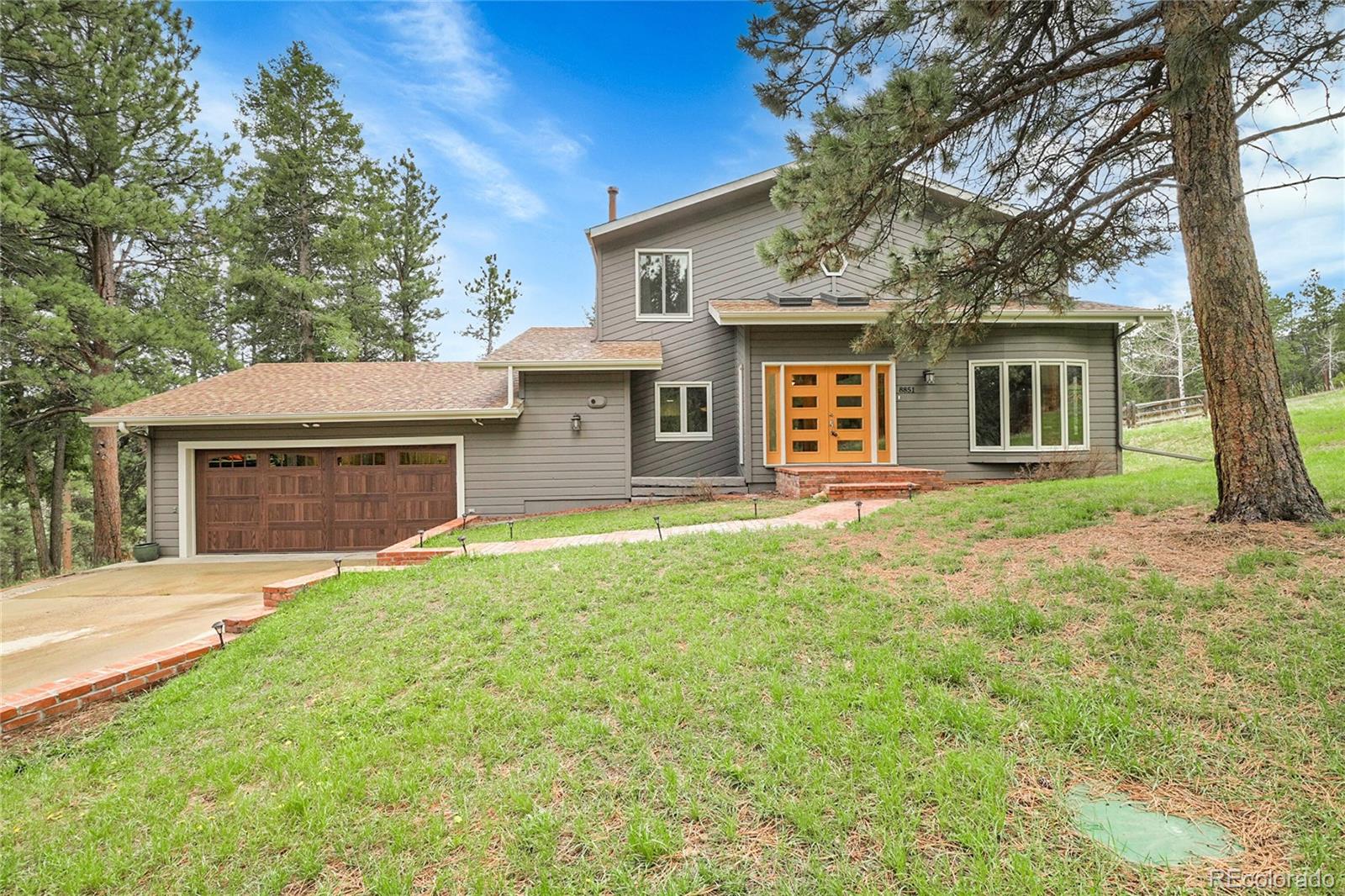 Valley Hi Evergreen Home | MLS #: 59315568851  Blue Creek Road, Evergreen Beds: 4 Baths: 4 Price: $999,000