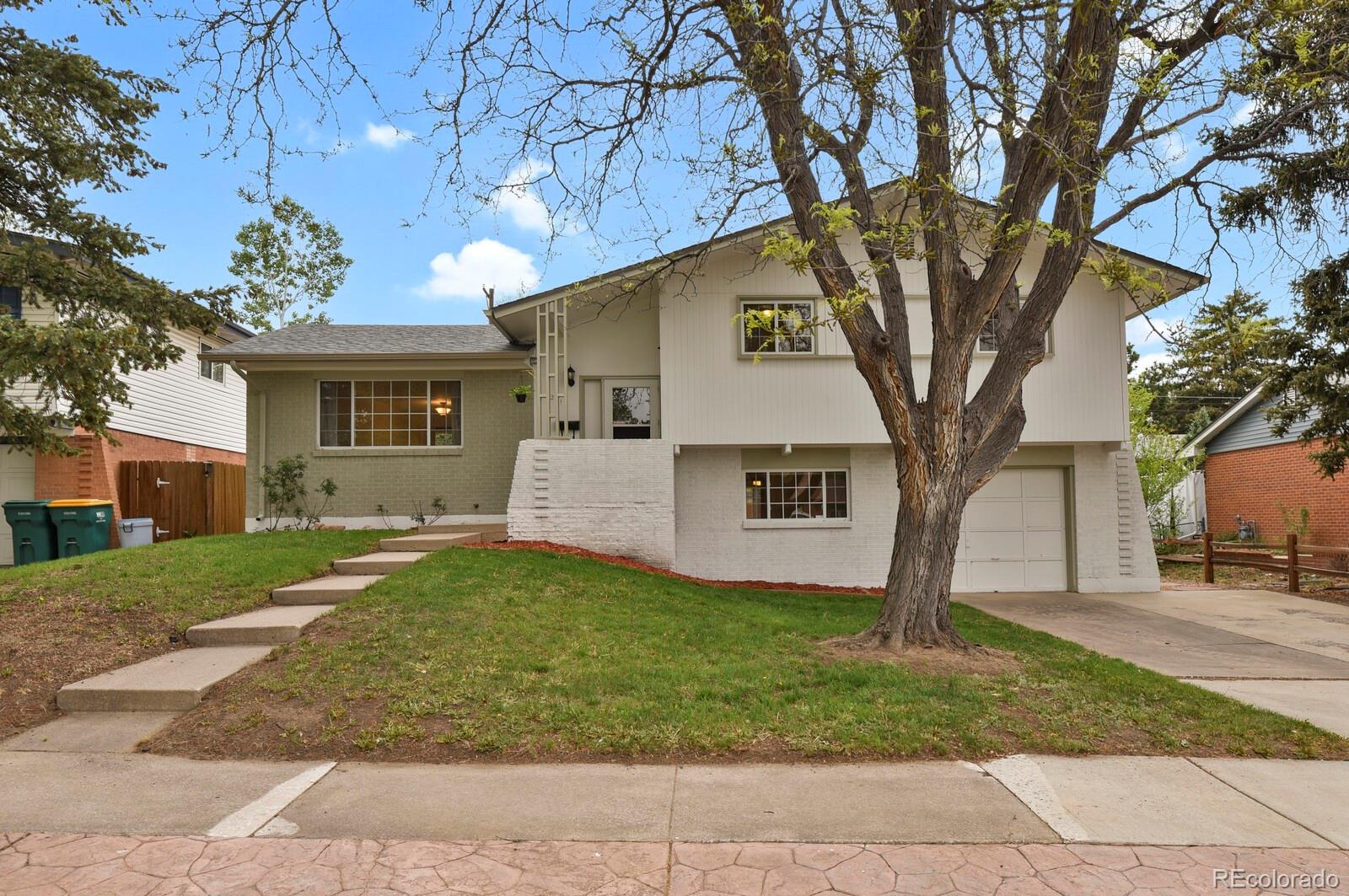 Century Heights Colorado Springs Home | MLS #: 40975652017  Collier Drive, Colorado Springs Beds: 3 Baths: 2 Price: $370,000