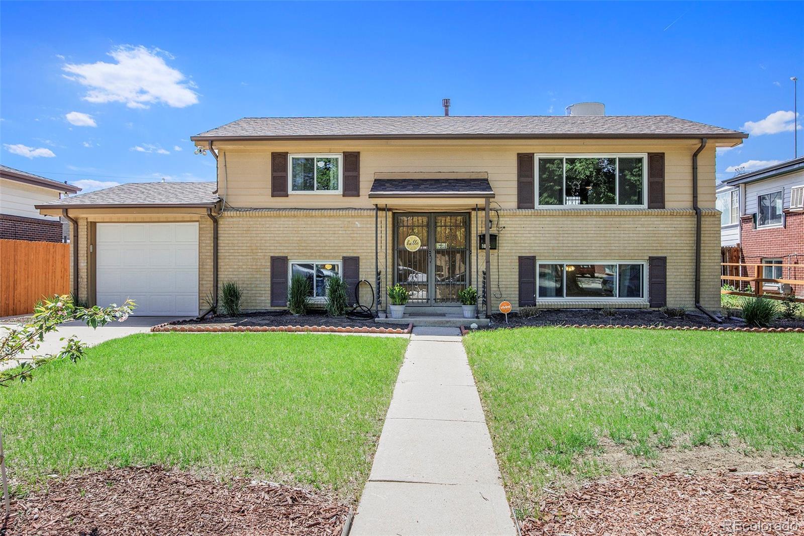 Morris Heights Aurora Home | MLS #: 25208833065  Zion Street, Aurora Beds: 4 Baths: 2 Price: $450,000