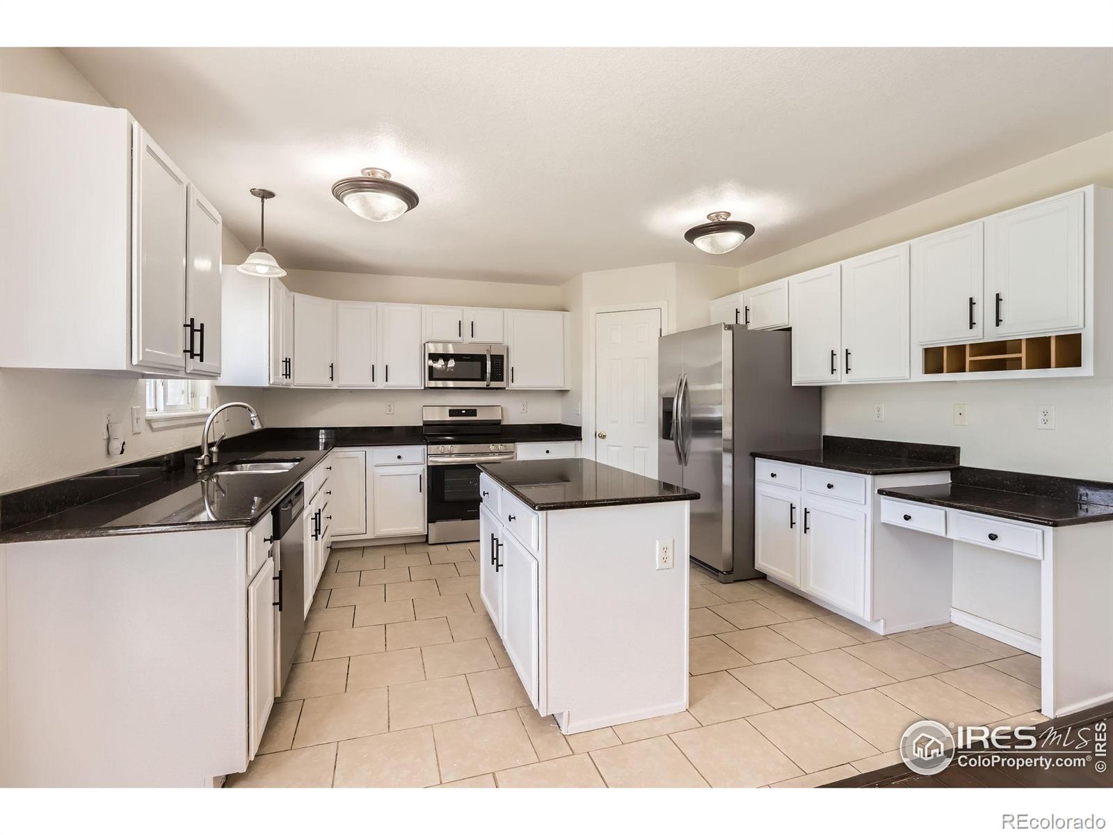 Mountain Shadows Sub 1st Fg Greeley Home | MLS #: 45678910340618614  19th Street, Greeley Beds: 4 Baths: 4 Price: $460,000