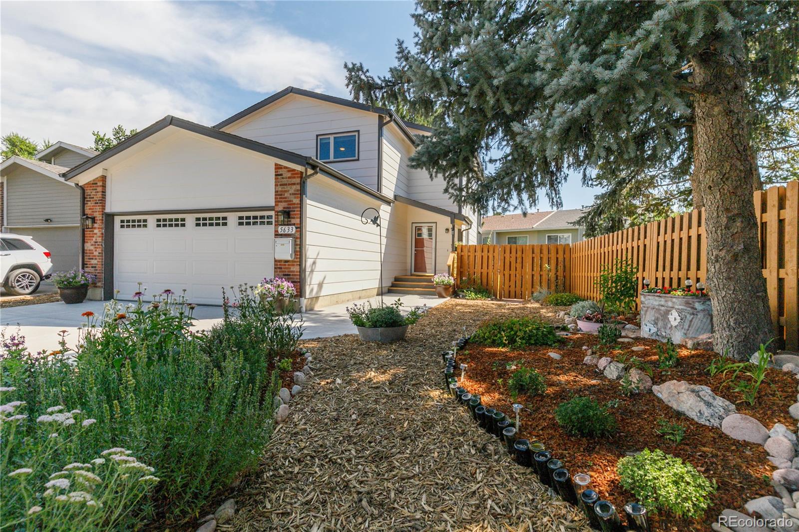 Lamar Heights Arvada Home | MLS #: 77484915633 W 71st Place, Arvada Beds: 3 Baths: 4 Price: $565,000