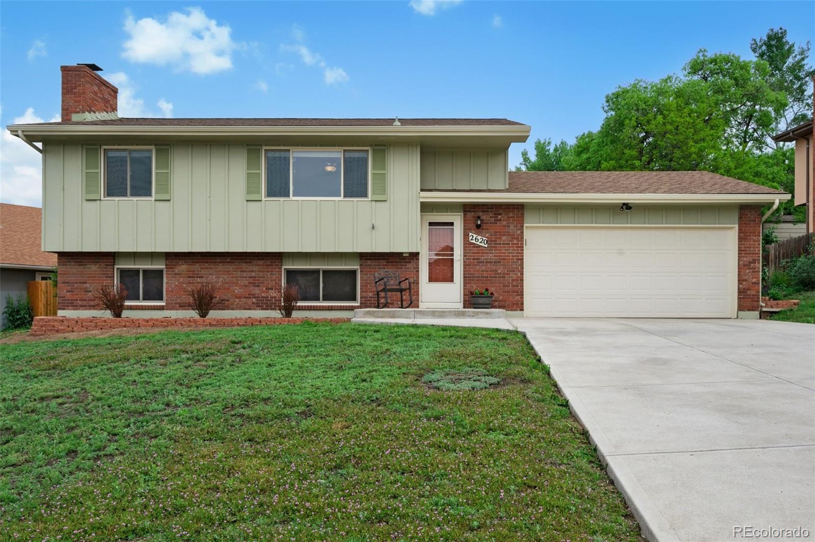 Vista Grande Colorado Springs Home | MLS #: 70735552620  Maroon Bells Avenue, Colorado Springs Beds: 4 Baths: 2 Price: $424,900