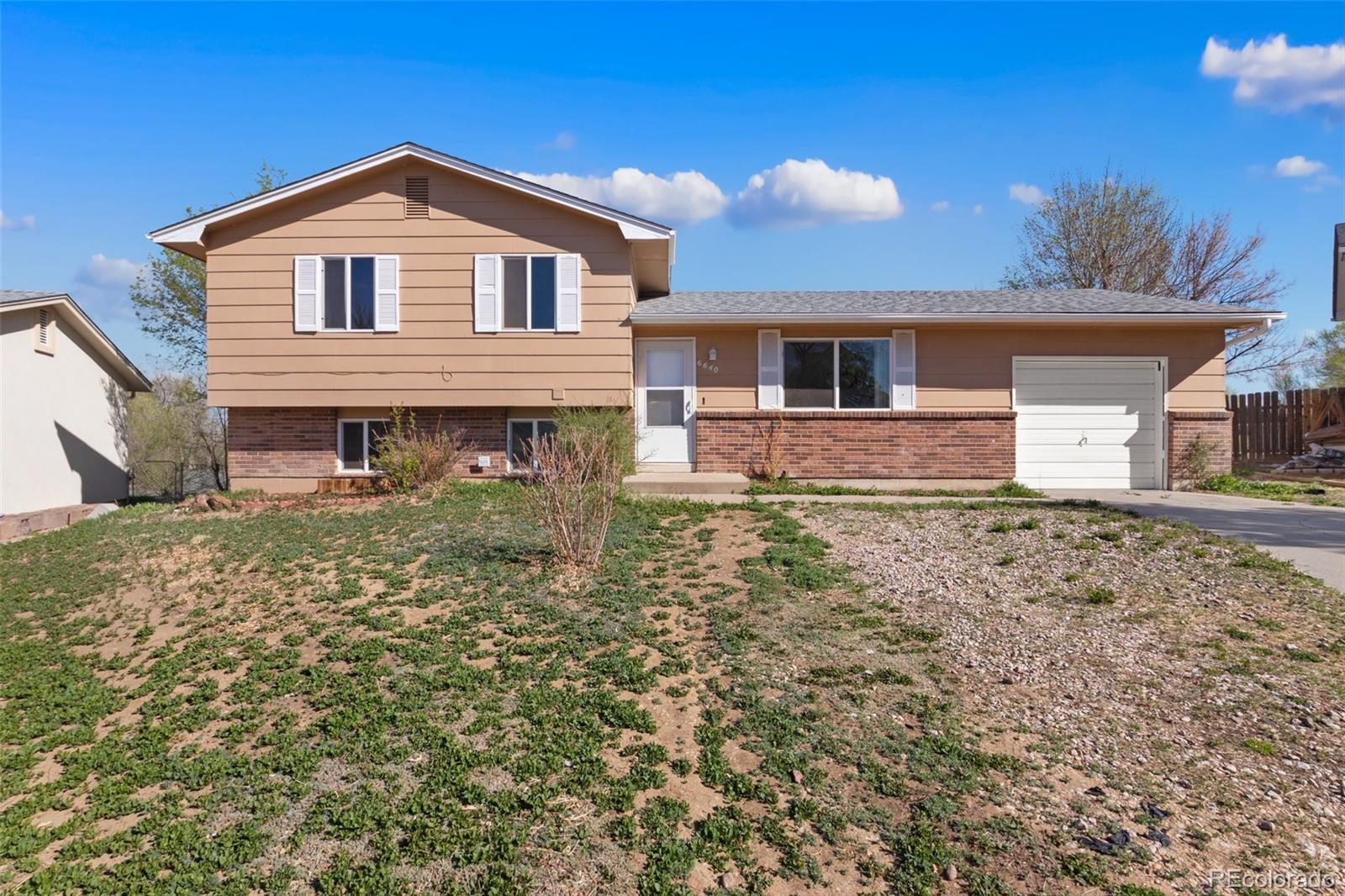 Widefield Country Club Heights Colorado Springs Home | MLS #: 21791046640  Player Place, Colorado Springs Beds: 4 Baths: 2 Price: $345,000