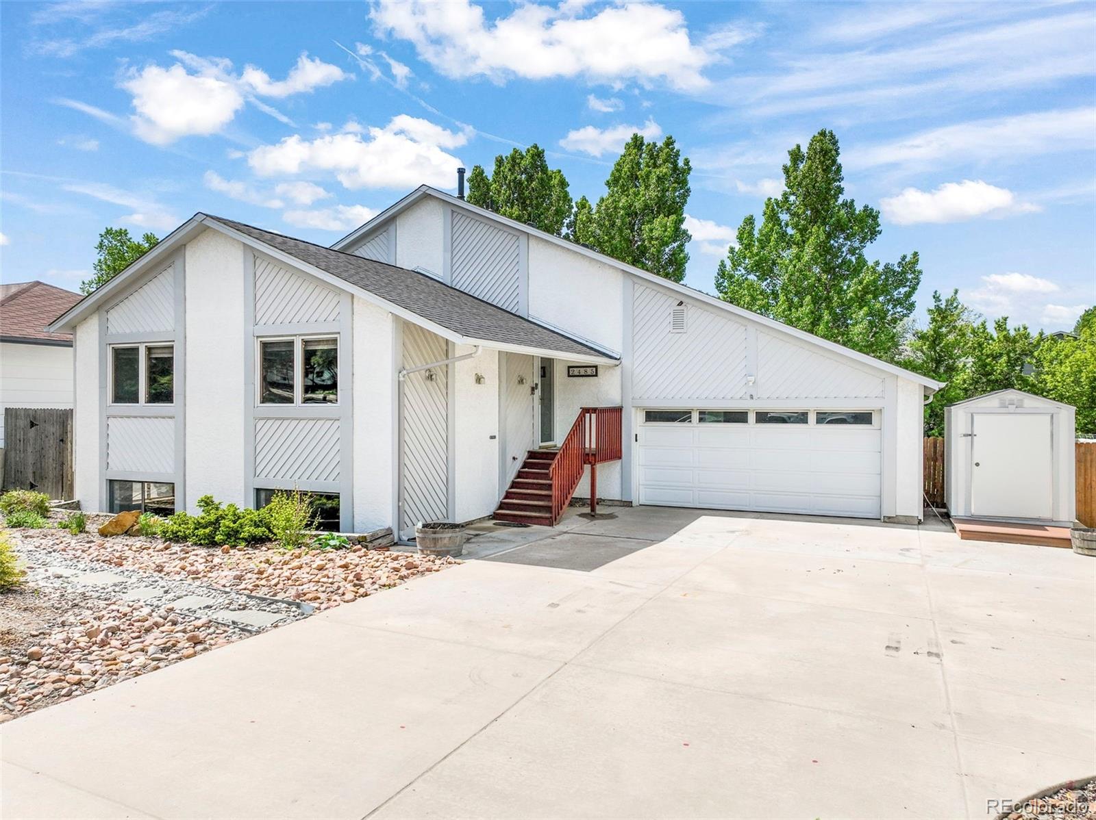 Vista Grande Terrace Colorado Springs Home | MLS #: 89407082485  Maroon Bells Avenue, Colorado Springs Beds: 3 Baths: 4 Price: $450,000