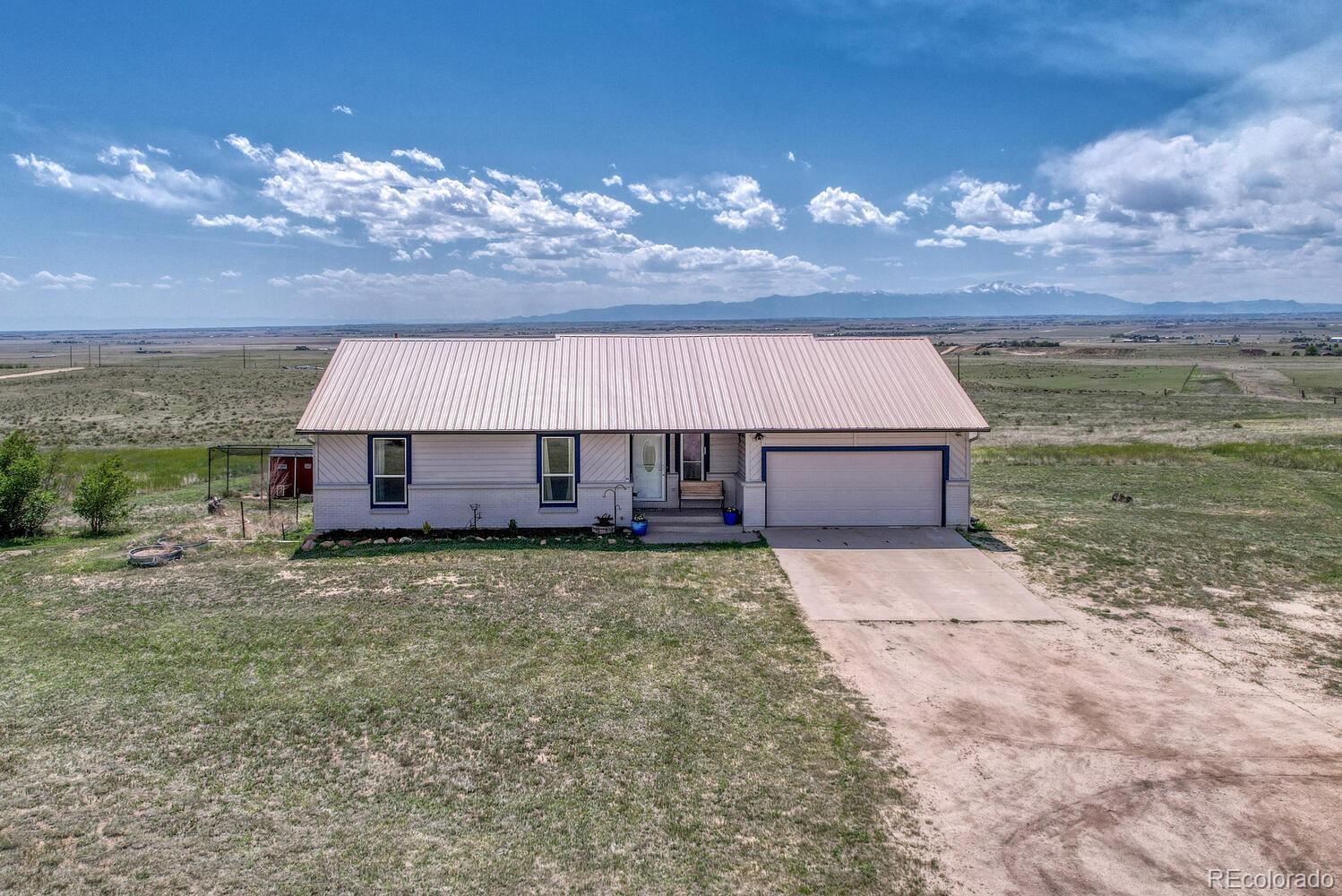 Calhan Home | MLS #: 31216887550  Soap Weed Road, Calhan Beds: 4 Baths: 3 Price: $645,000