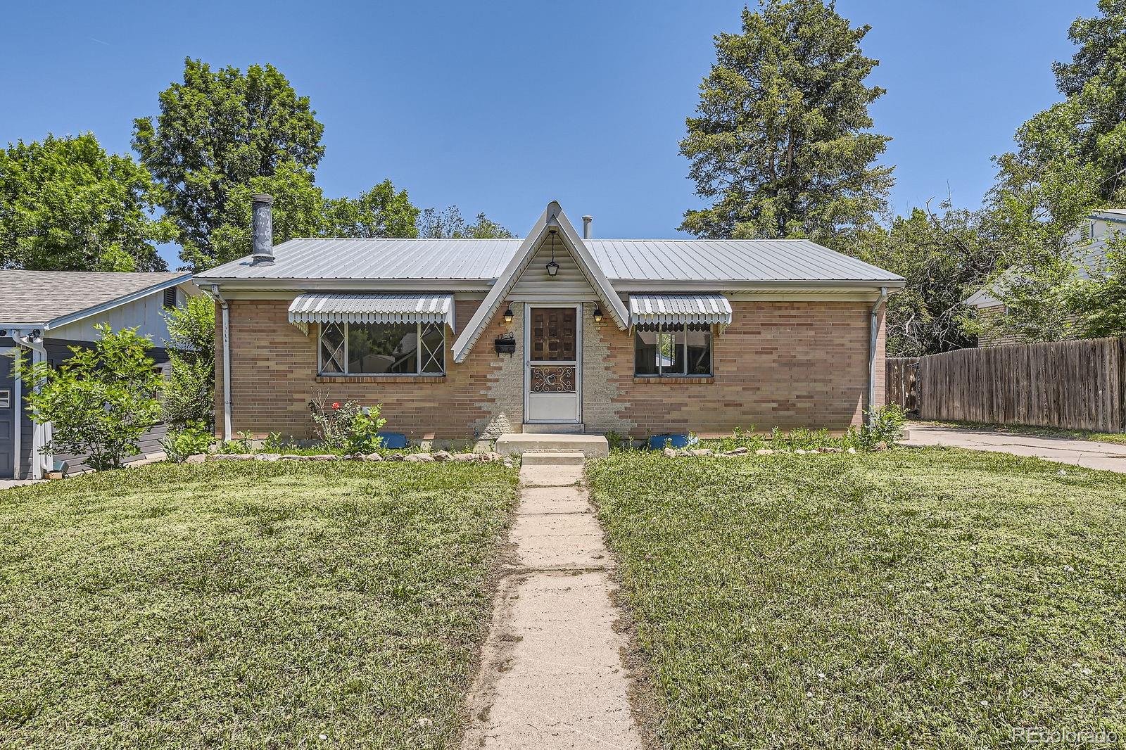 Ruby Hill Denver Home | MLS #: 66395041750 S Dale Court, Denver Beds: 4 Baths: 2 Price: $440,000