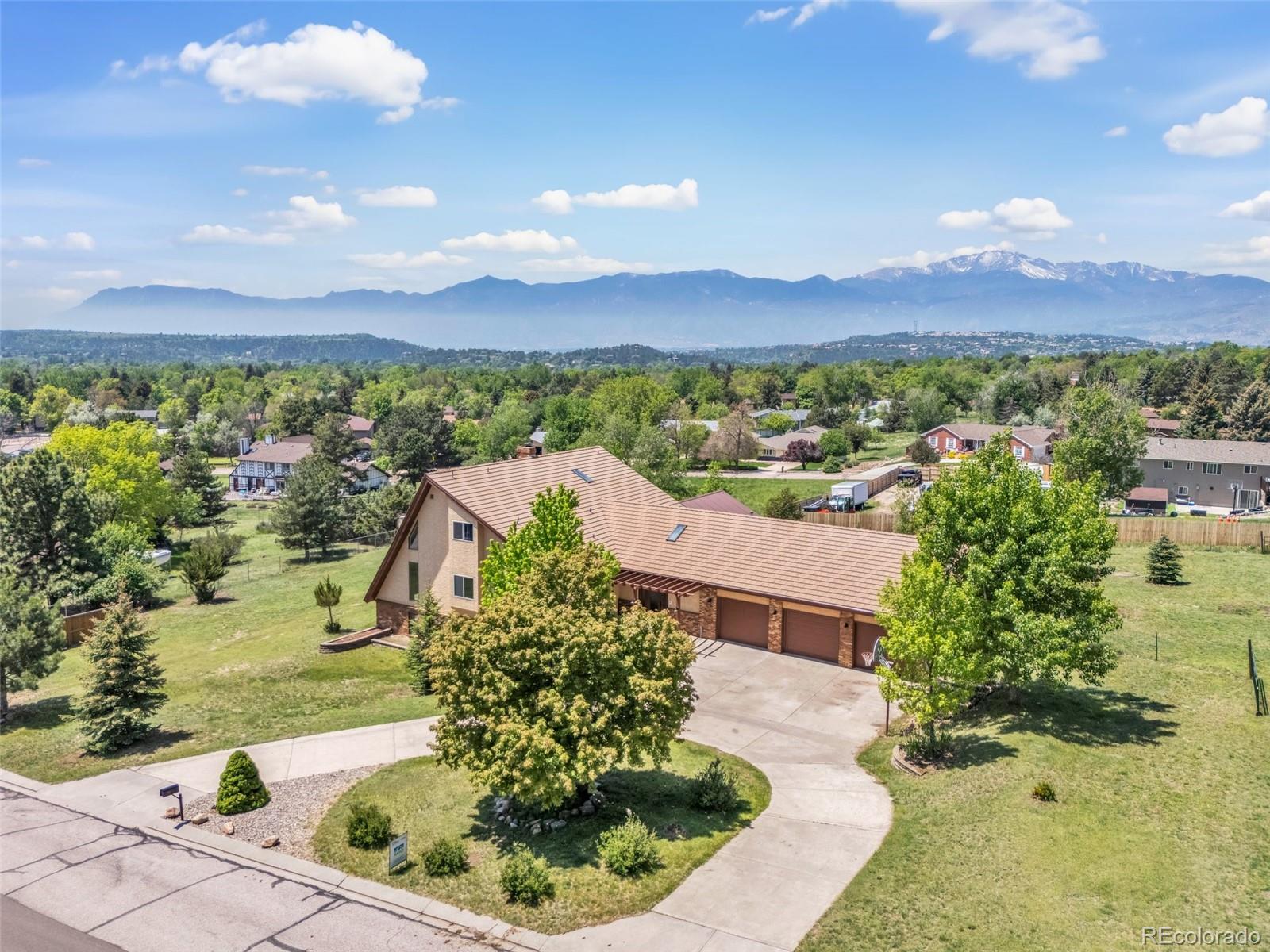 Vista Grande Colorado Springs Home | MLS #: 38942465220  Lomita Road, Colorado Springs Beds: 5 Baths: 3 Price: $900,000