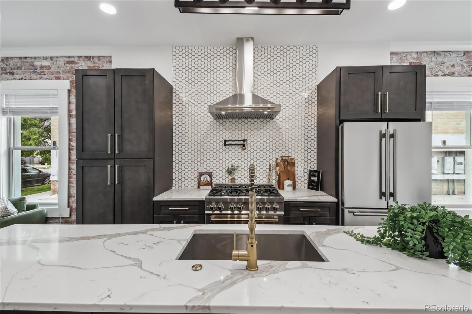Hunts Denver Home | MLS #: 87696631024 W 8th Avenue, Denver Beds: 3 Baths: 4 Price: $750,000