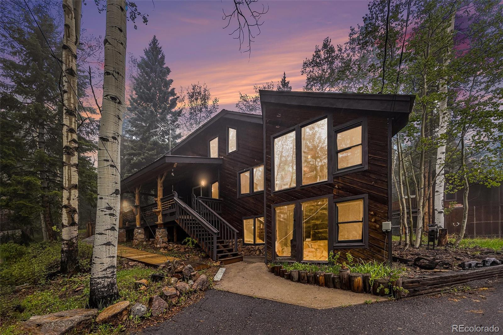 Conifer Mountain Conifer Home | MLS #: 198009210419  Christopher Drive, Conifer Beds: 3 Baths: 3 Price: $875,000