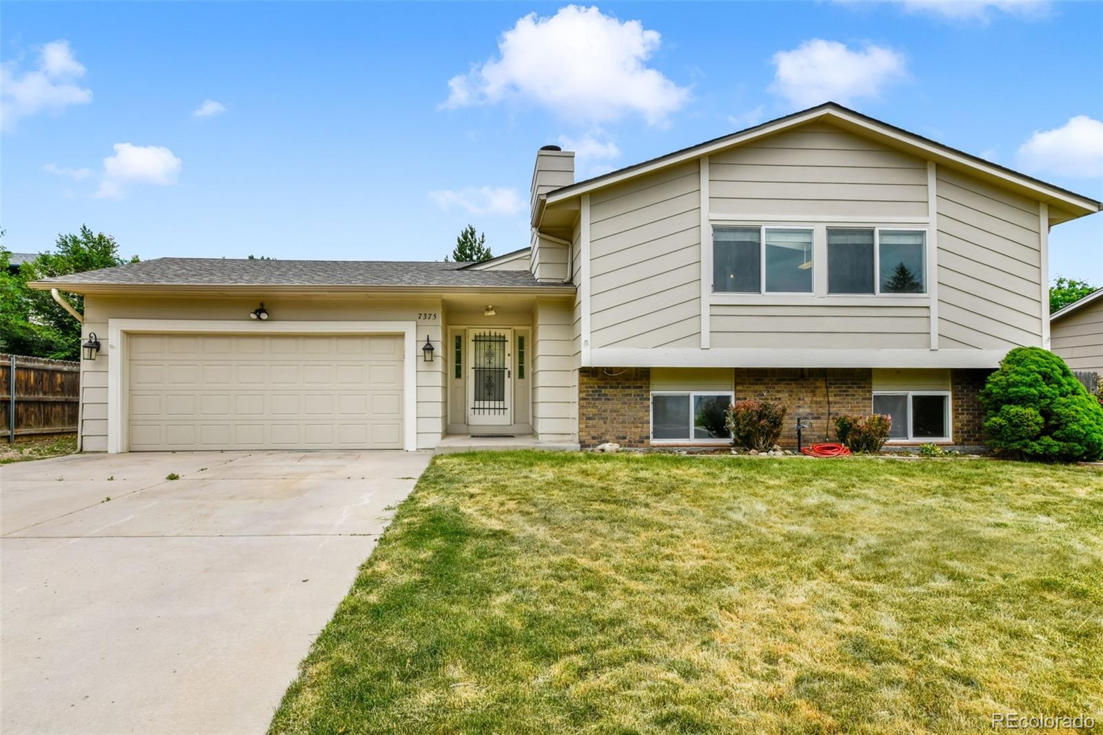 Sunrise Ridge Colorado Springs Home | MLS #: 22033497375  Painted Rock Drive, Colorado Springs Beds: 4 Baths: 3 Price: $375,000