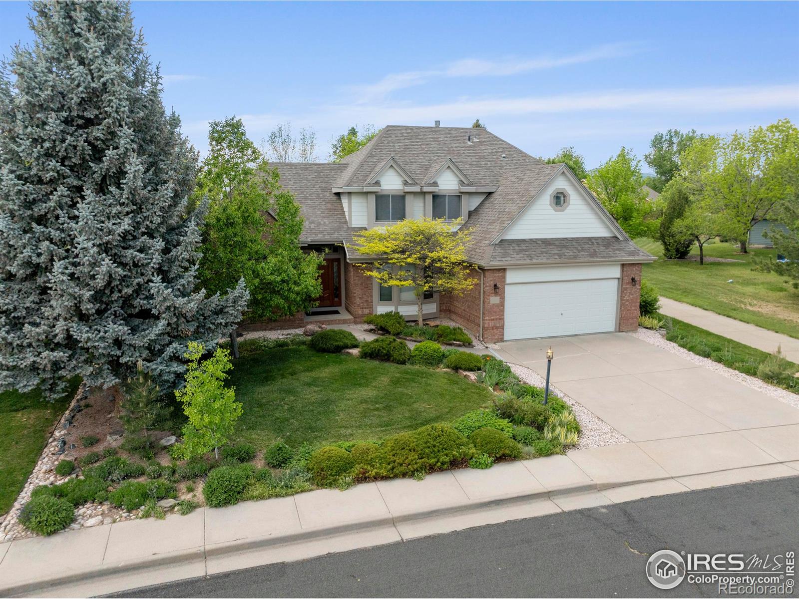 Emerald Glen Loveland Home | MLS #: 45678910357232335  Buckingham Circle, Loveland Beds: 4 Baths: 3 Price: $650,000
