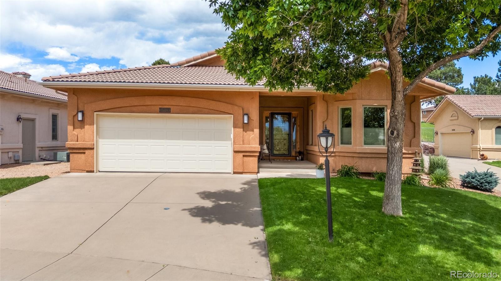 Pine Creek Colorado Springs Home | MLS #: 50863002467  Spanish Oak Terrace, Colorado Springs Beds: 4 Baths: 4 Price: $750,000