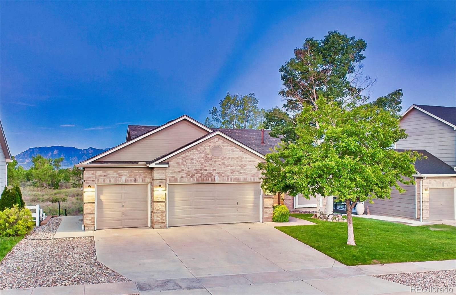Springs Ranch Colorado Springs Home | MLS #: 87586653270  Pony Tracks Drive, Colorado Springs Beds: 4 Baths: 3 Price: $575,000