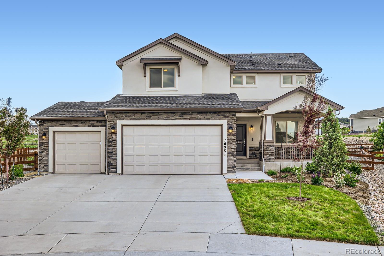 Jackson Creek Monument Home | MLS #: 881771216881  Roaming Elk Drive, Monument Beds: 5 Baths: 4 Price: $719,000
