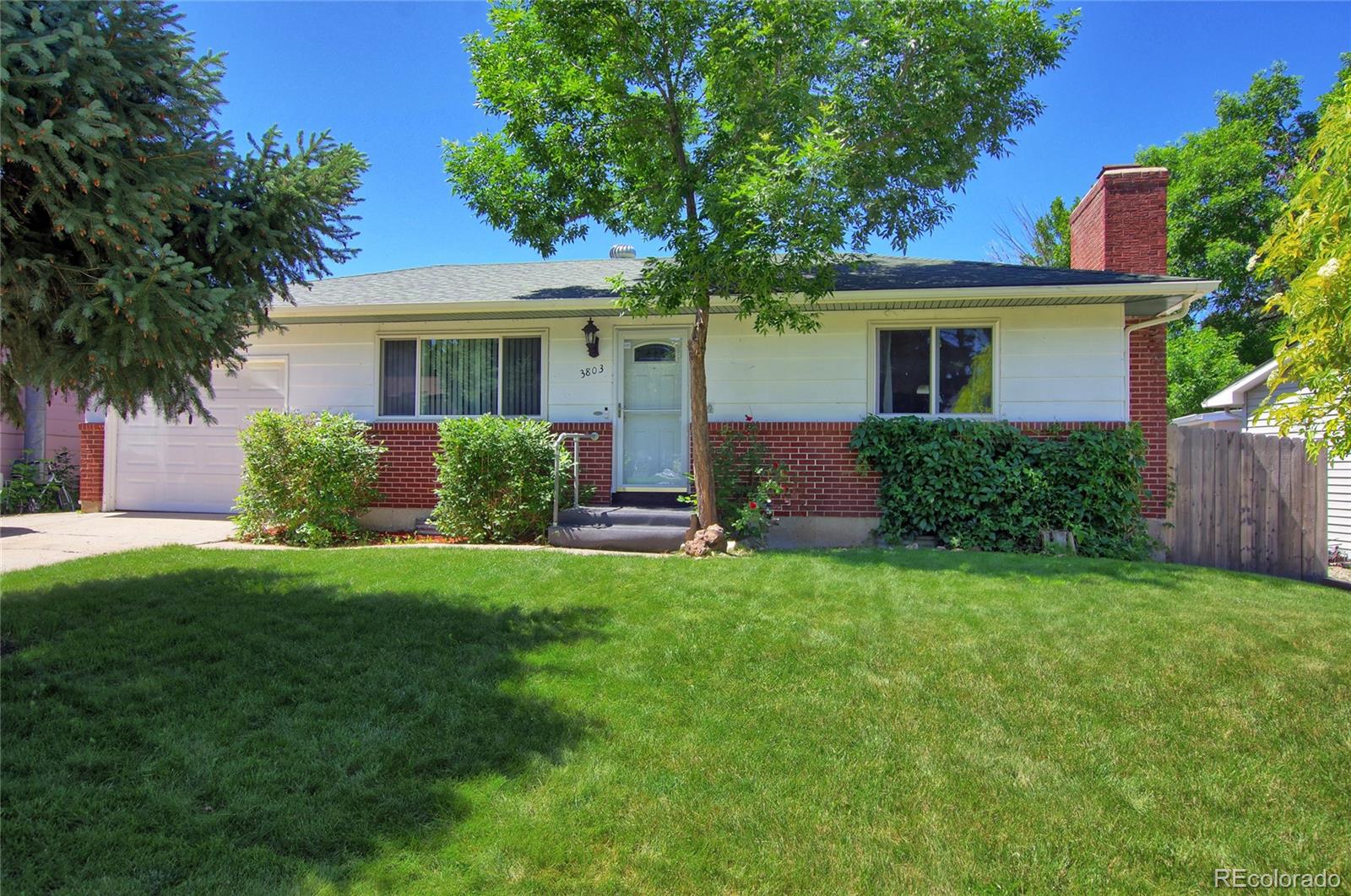 Vista Grande Colorado Springs Home | MLS #: 19908683803  Encino Street, Colorado Springs Beds: 4 Baths: 2 Price: $400,000