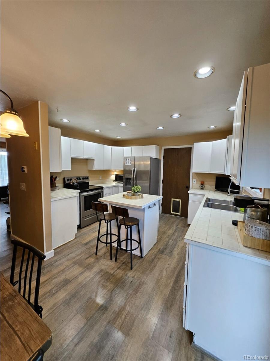 Aurora Knolls Aurora Home | MLS #: 45462142034 S Truckee Street, Aurora Beds: 4 Baths: 2 Price: $440,000