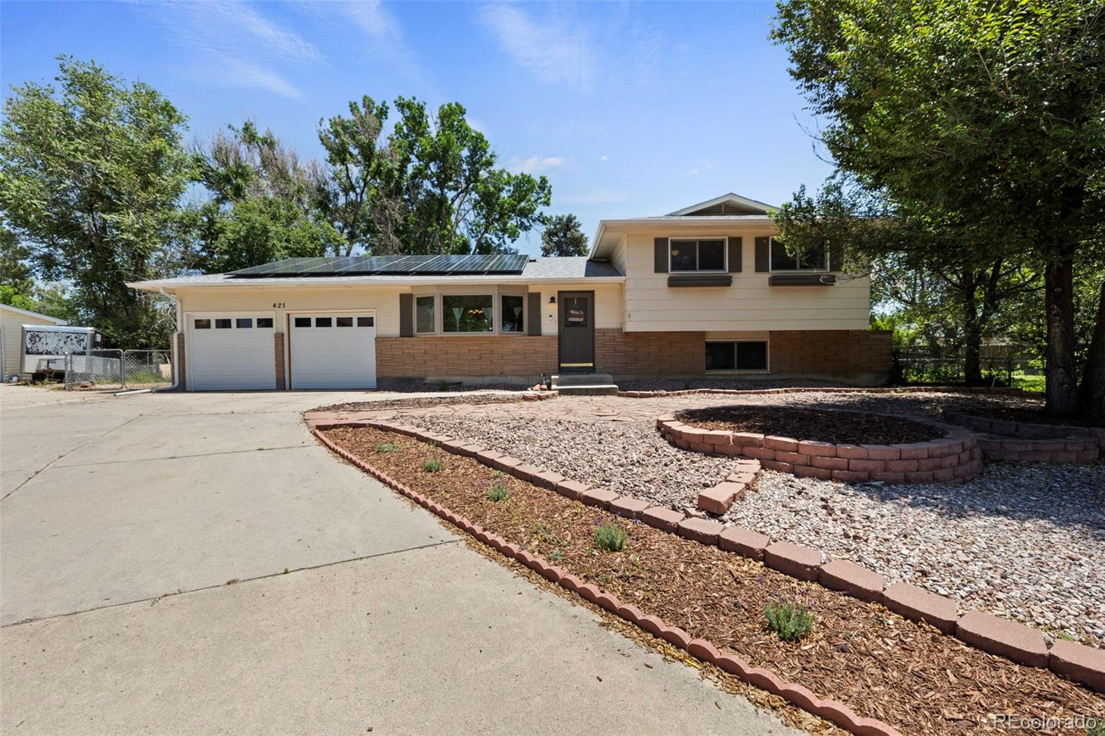 Wilsons Widefield Colorado Springs Home | MLS #: 5754585421  Harvard Street, Colorado Springs Beds: 4 Baths: 3 Price: $400,000