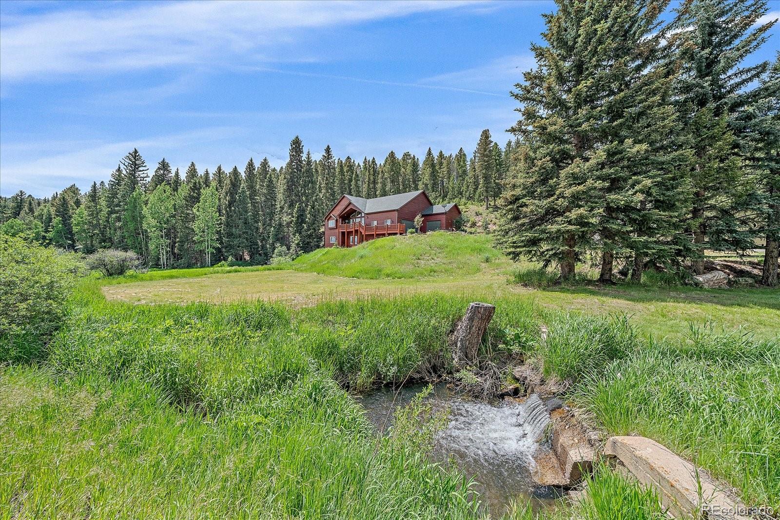  Conifer Home | MLS #: 963630427612  Shadow Mountain Drive, Conifer Beds: 4 Baths: 3 Price: $999,000