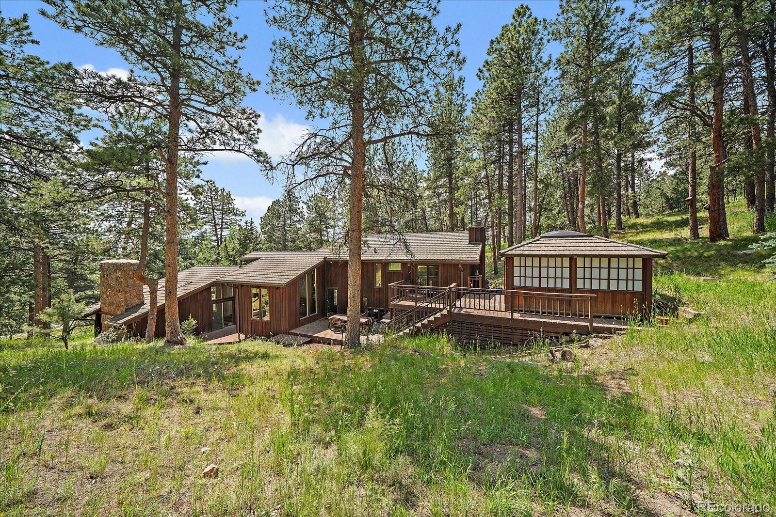 Hiwan Evergreen Home | MLS #: 88214703251  Interlocken Drive, Evergreen Beds: 4 Baths: 4 Price: $1,150,000