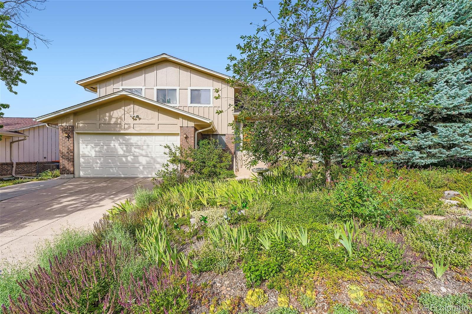 Hutchinsons Green Mountain Lakewood Home | MLS #: 652169013934 W Warren Drive, Lakewood Beds: 4 Baths: 3 Price: $675,000