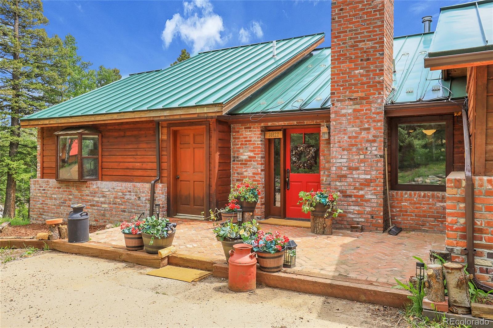 Conifer Mountain Conifer Home | MLS #: 177458930122  Nancys Lane, Conifer Beds: 3 Baths: 3 Price: $650,000