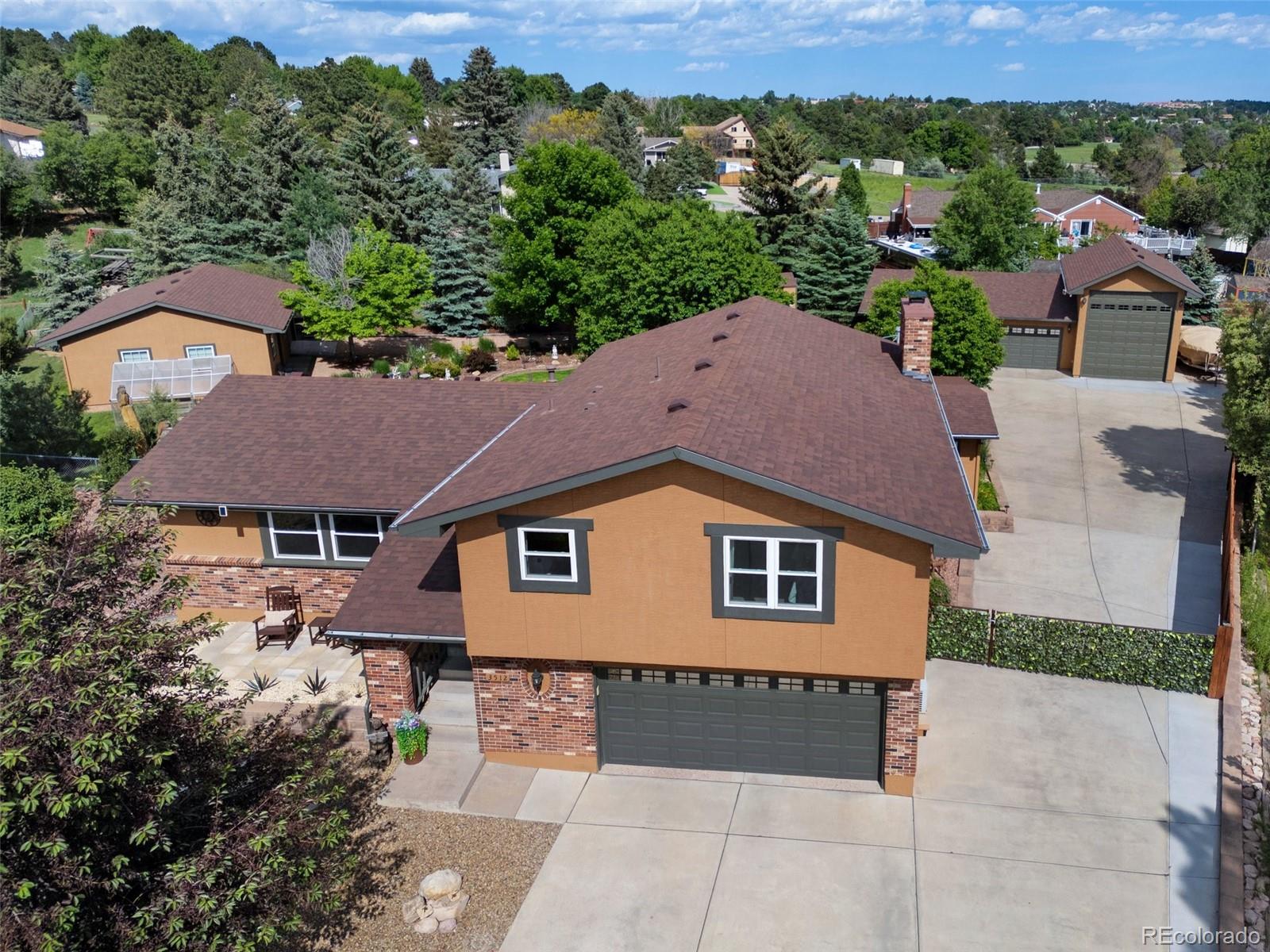 Vista Grande Colorado Springs Home | MLS #: 59423443512  Chico Circle, Colorado Springs Beds: 4 Baths: 4 Price: $875,000
