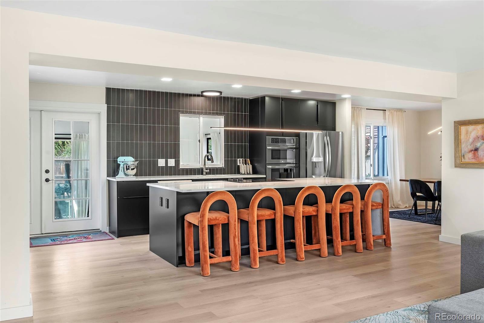 Columbine Knolls South Littleton Home | MLS #: 49094037591 S Reed Court, Littleton Beds: 5 Baths: 4 Price: $935,000