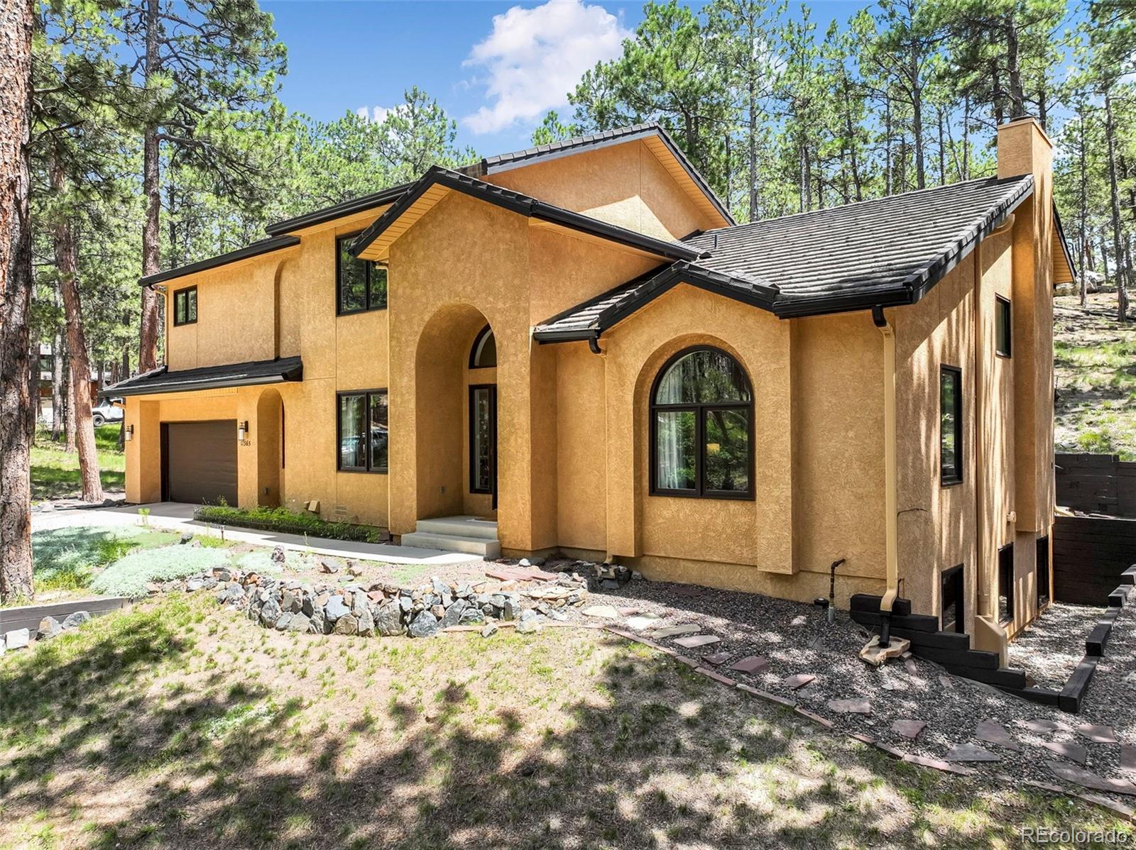 Woodmoor Monument Home | MLS #: 469335317365  Caribou Drive, Monument Beds: 4 Baths: 4 Price: $749,900