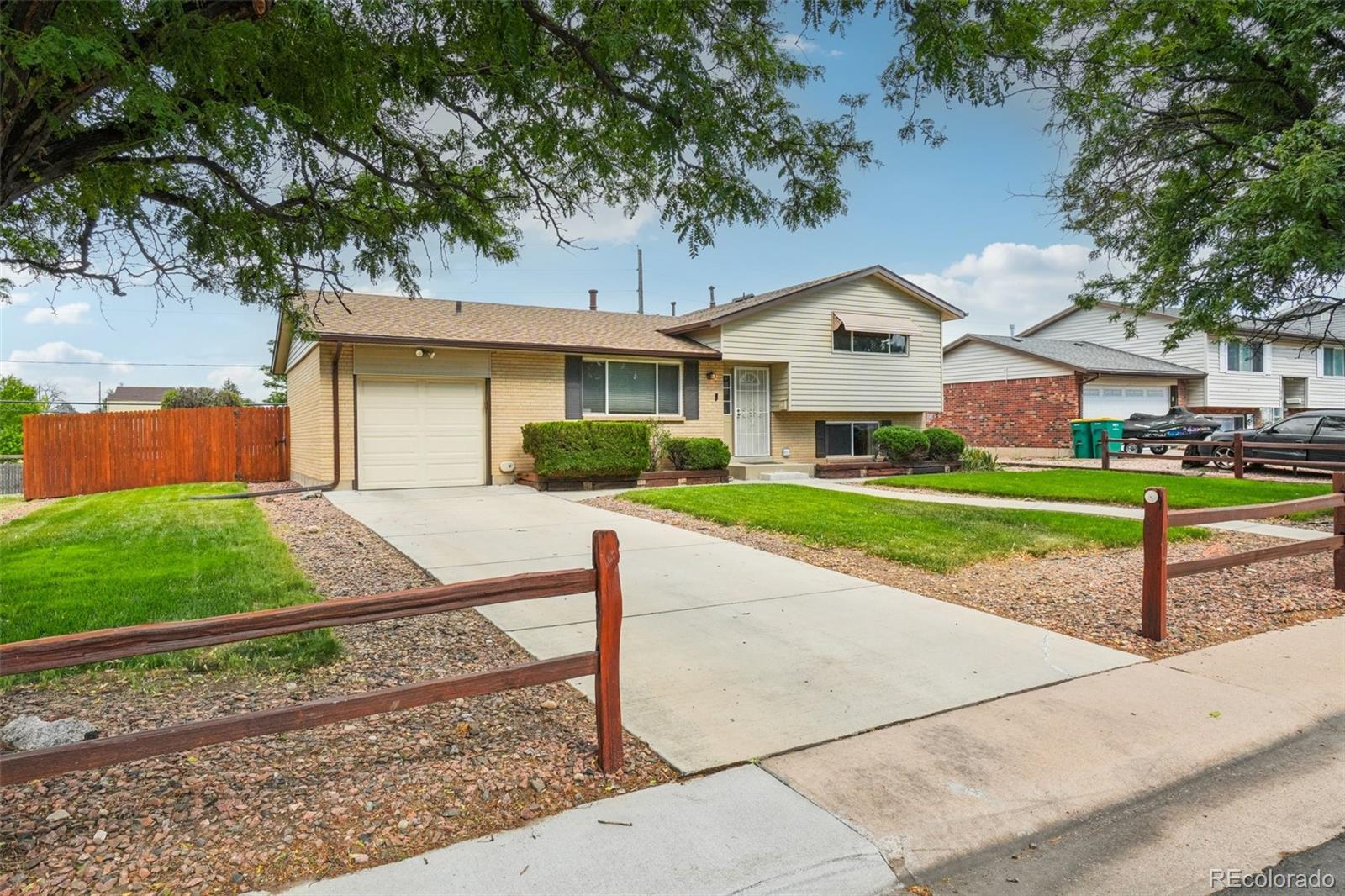 Chambers Heights Aurora Home | MLS #: 28158701088  Granby Street, Aurora Beds: 4 Baths: 2 Price: $425,500