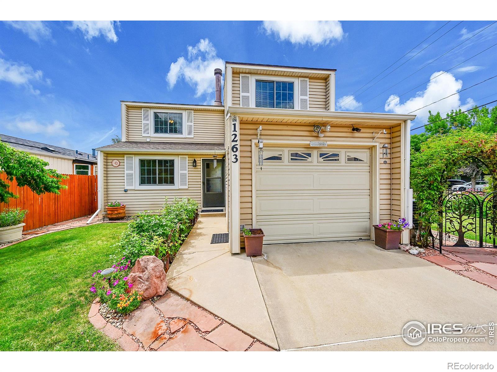 1263  Meadow Street, longmont MLS: 4567891038384 Beds: 4 Baths: 2 Price: $400,000