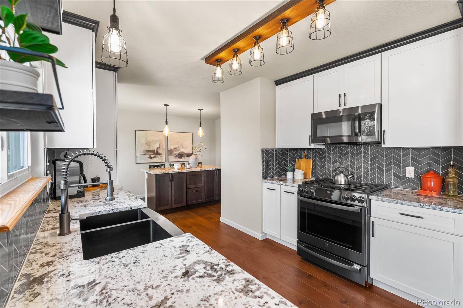 Lamar Heights Arvada Home | MLS #: 54400816858  Otis Court, Arvada Beds: 3 Baths: 4 Price: $799,900