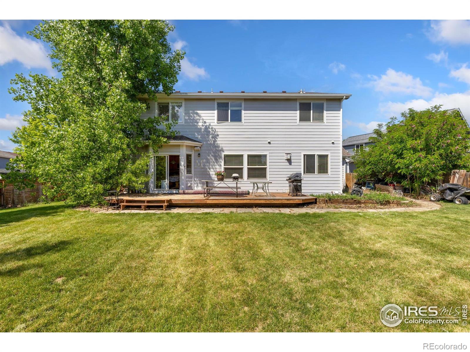 Sharpe Dacono Home | MLS #: 4567891038759670  Short Court, Dacono Beds: 6 Baths: 4 Price: $595,000