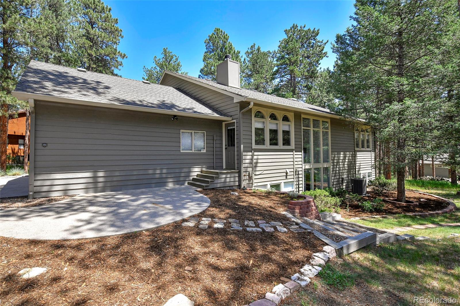 Woodmoor Monument Home | MLS #: 379560520085  Broken Saber Lane, Monument Beds: 4 Baths: 3 Price: $850,000
