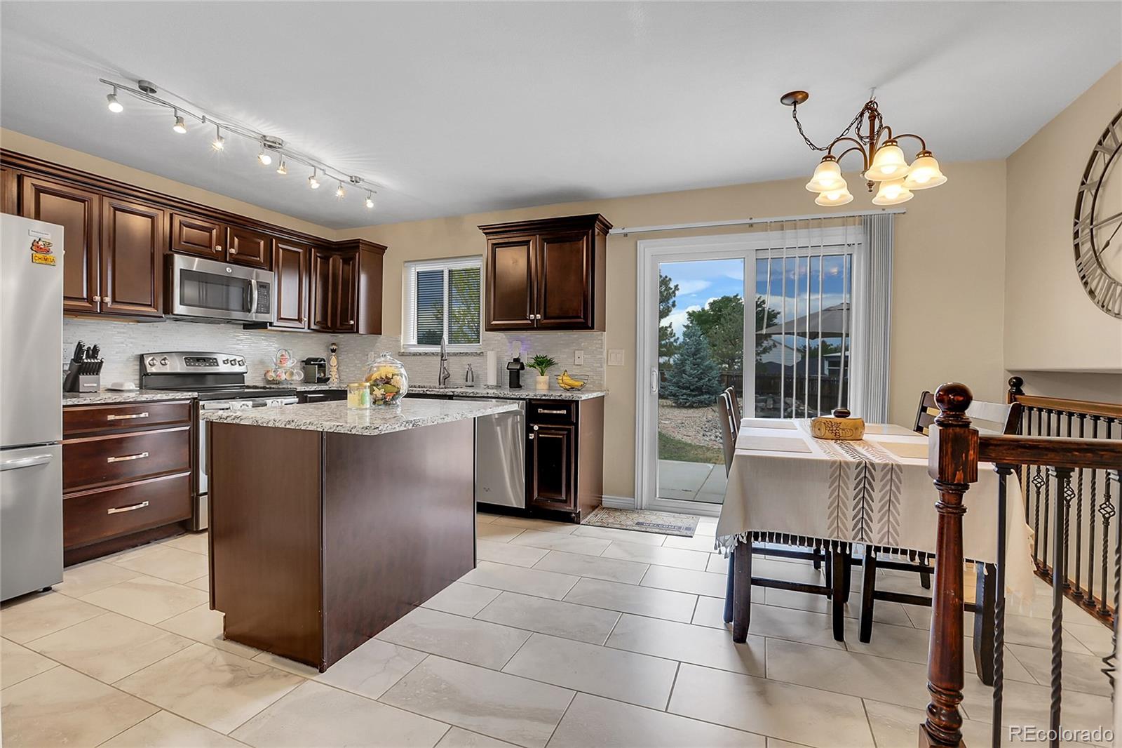 Stone Ridge Aurora Home | MLS #: 98292381599 S Bahama Street, Aurora Beds: 3 Baths: 3 Price: $498,000