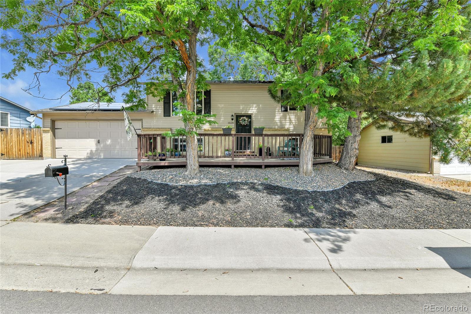 Woods Denver Home | MLS #: 21305941528 S Robb Court, Denver Beds: 4 Baths: 3 Price: $575,000