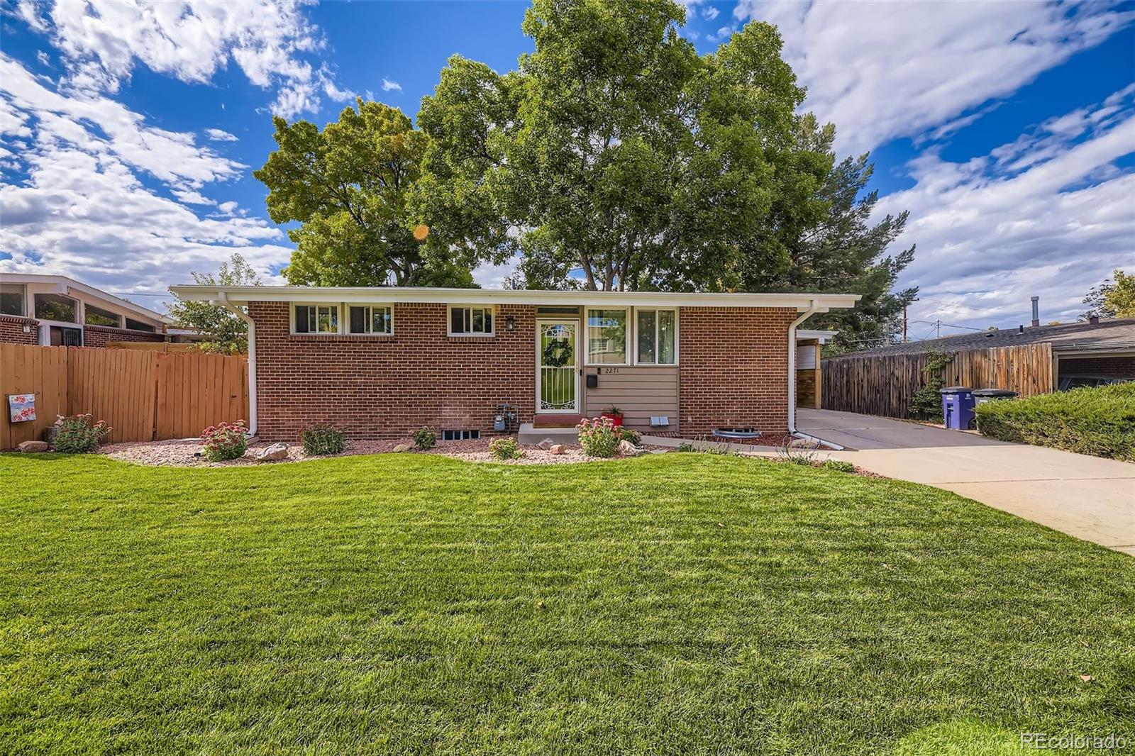 Harvey Park Denver Home | MLS #: 66415682271 S Quitman Way, Denver Beds: 4 Baths: 2 Price: $515,000