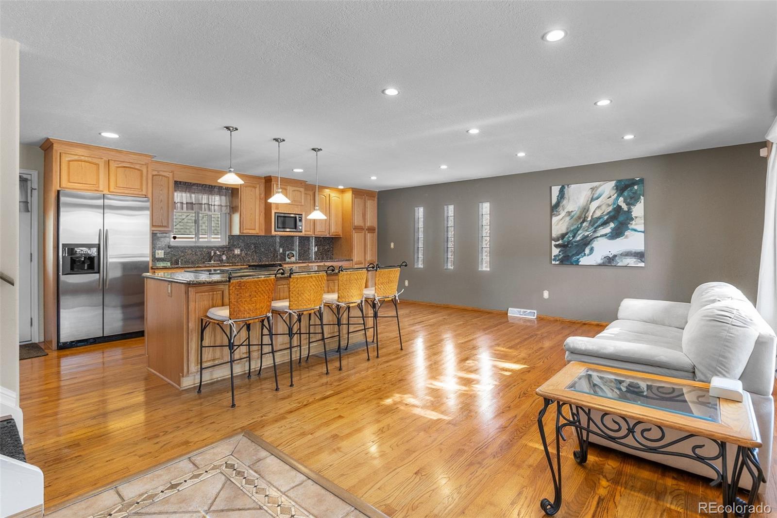 Bear Valley Denver Home | MLS #: 26278162765 S Pierce Street, Denver Beds: 4 Baths: 4 Price: $635,000