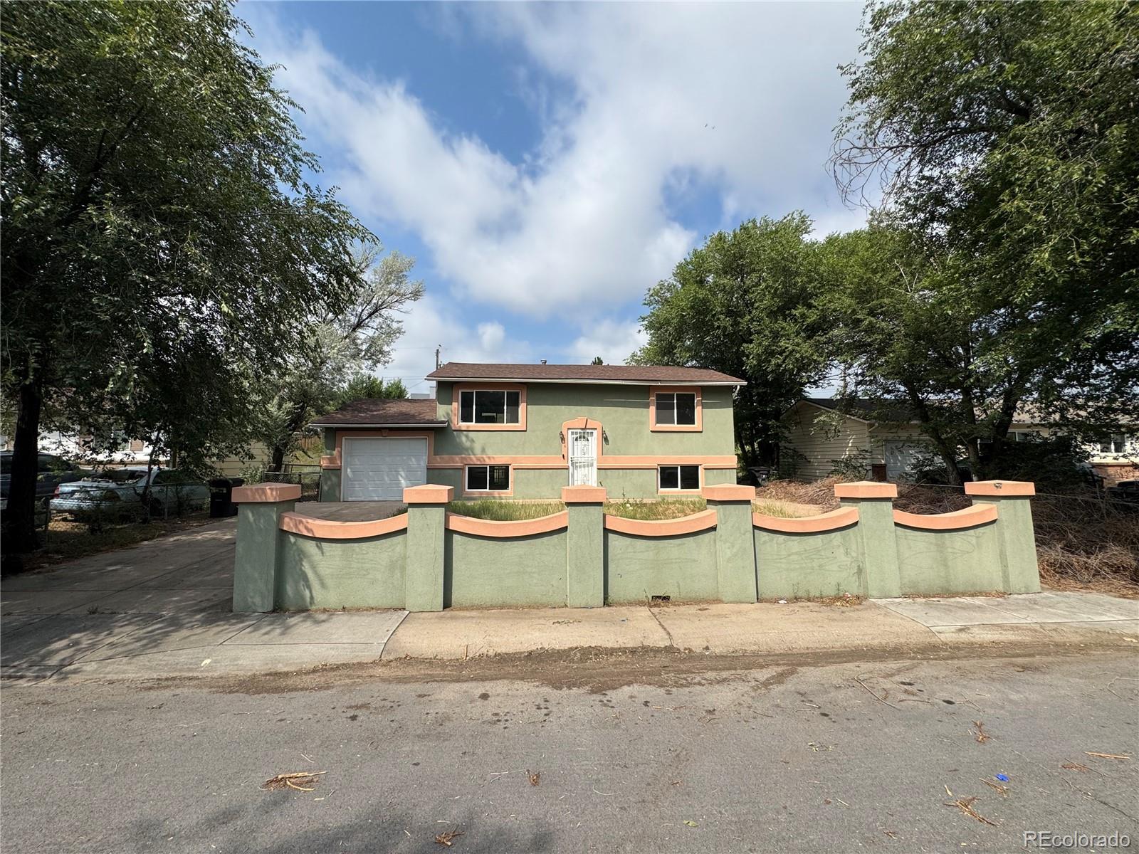 Stratmoor Colorado Springs Home | MLS #: 40018131116  Cambridge Avenue, Colorado Springs Beds: 4 Baths: 2 Price: $257,500