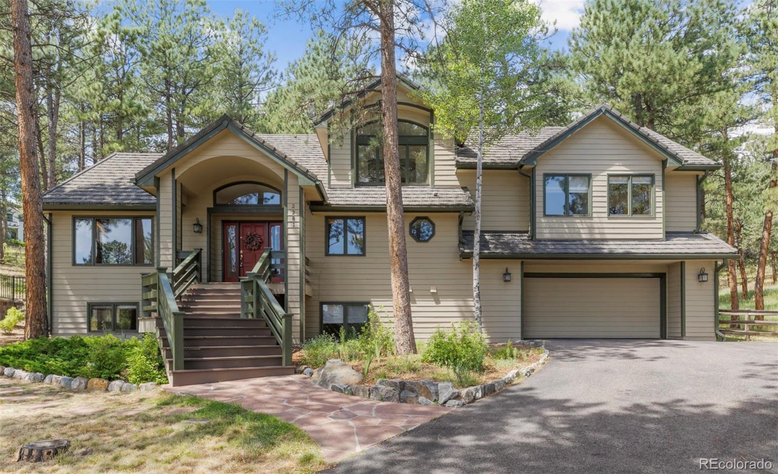Hiwan Evergreen Home | MLS #: 85407372281  Baldy Lane, Evergreen Beds: 5 Baths: 4 Price: $1,639,000