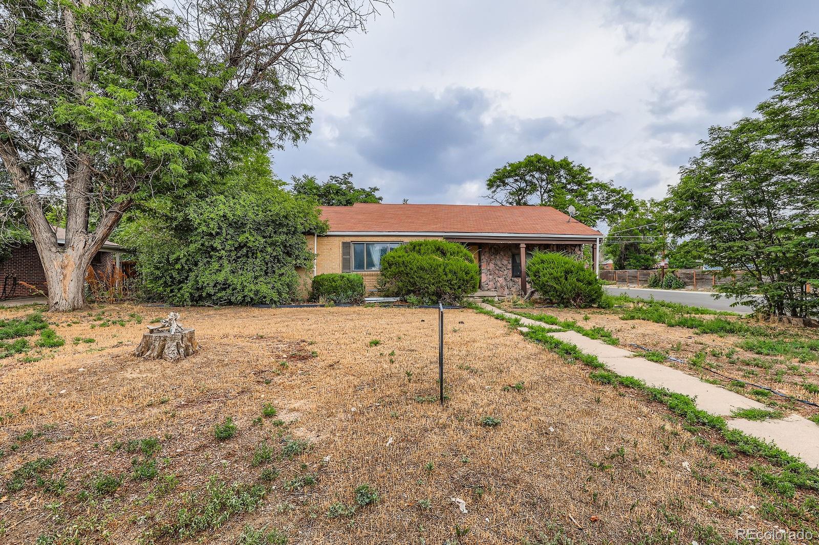Colfax Denver Home | MLS #: 80744732200  Poplar Street, Denver Beds: 5 Baths: 3 Price: $449,000