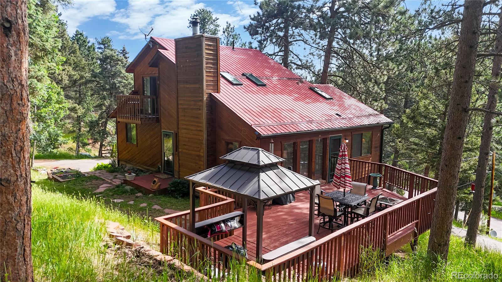 Conifer Meadows Conifer Home | MLS #: 982873412059  Black Hawk Drive, Conifer Beds: 4 Baths: 3 Price: $689,000