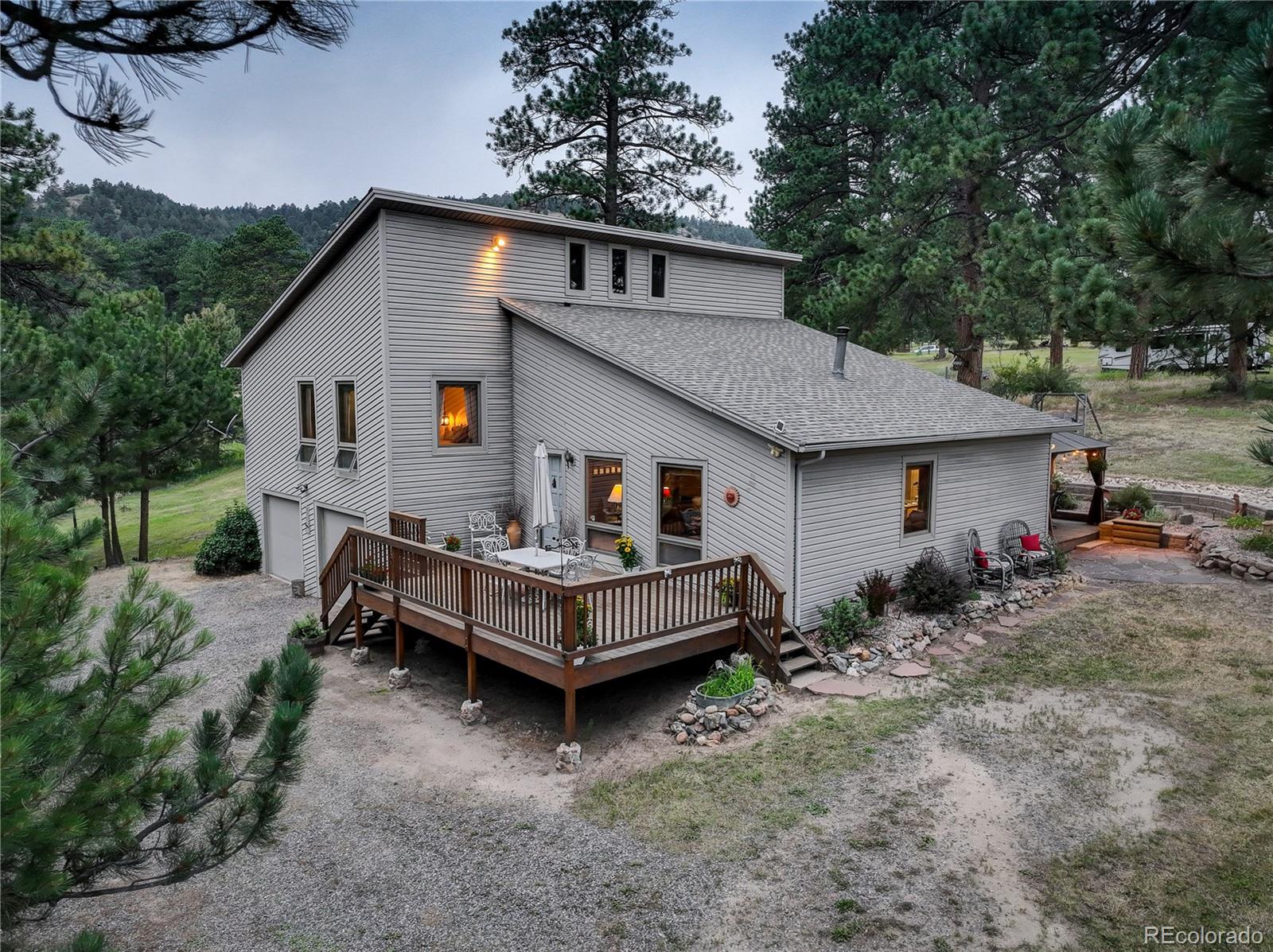  Evergreen Home | MLS #: 31328327033  Silverhorn Drive, Evergreen Beds: 4 Baths: 3 Price: $745,000