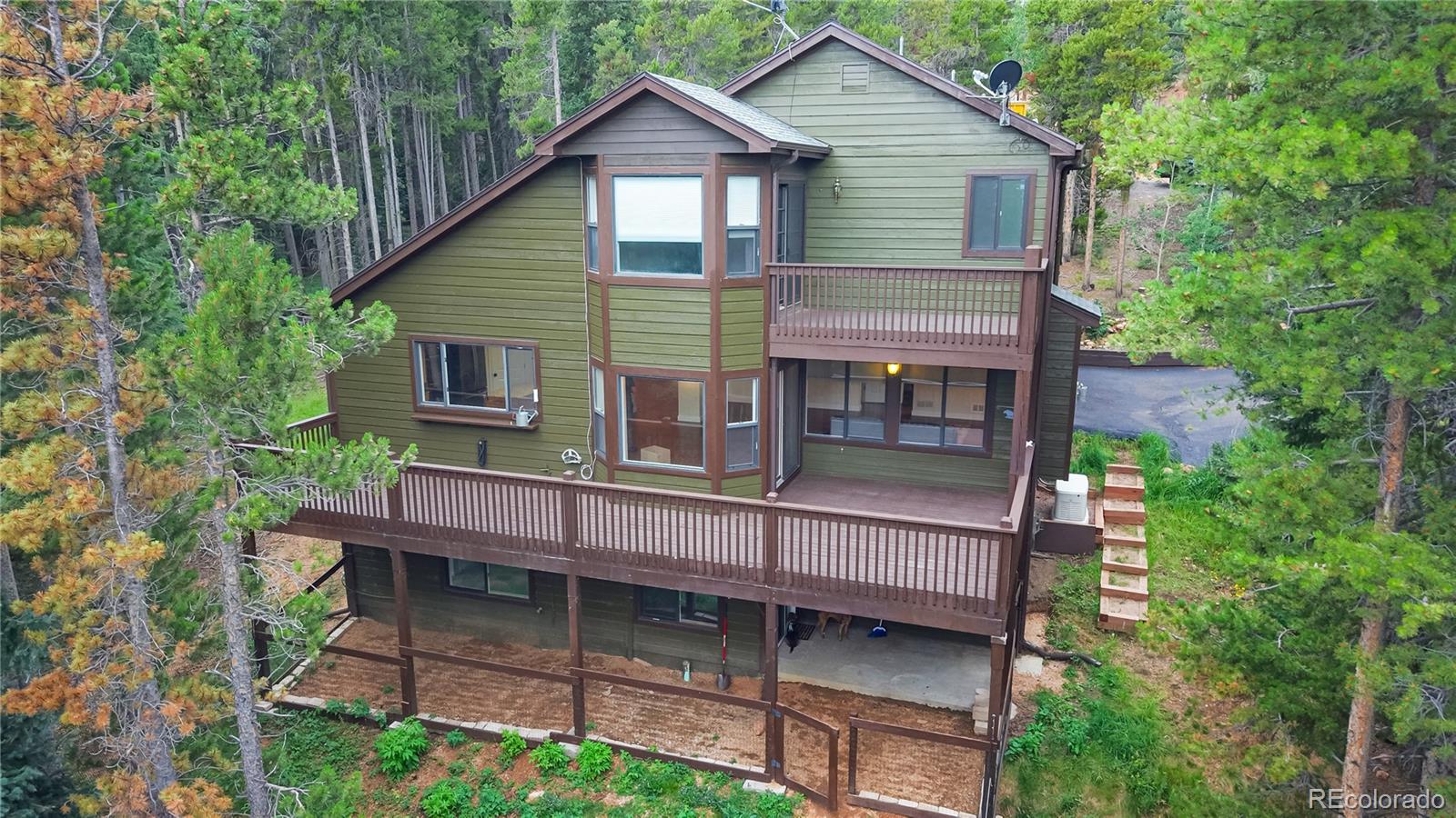 Conifer Mountain Conifer Home | MLS #: 216753110489  Christopher Drive, Conifer Beds: 3 Baths: 4 Price: $975,000